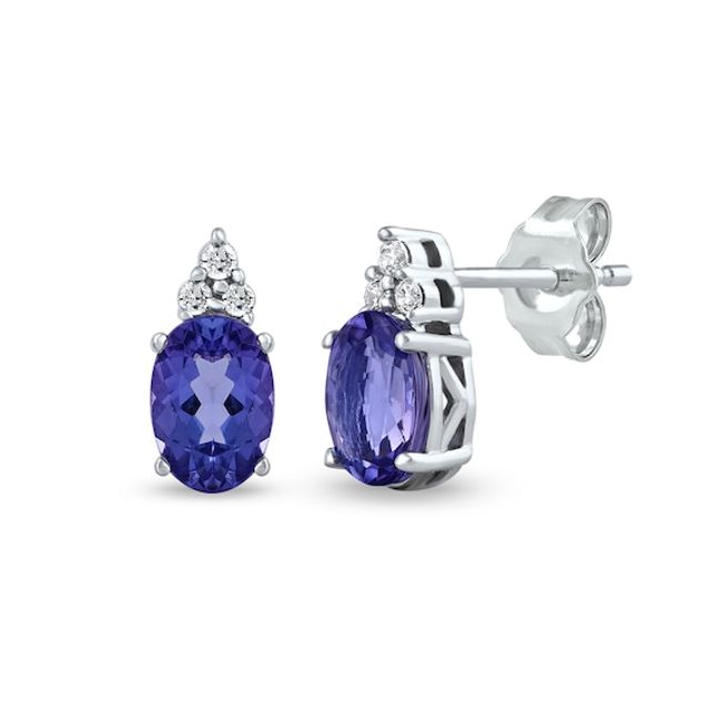 Oval Tanzanite and 1/20 CT. T.w. Diamond Tri-Top Stud Earrings in 10K White Gold