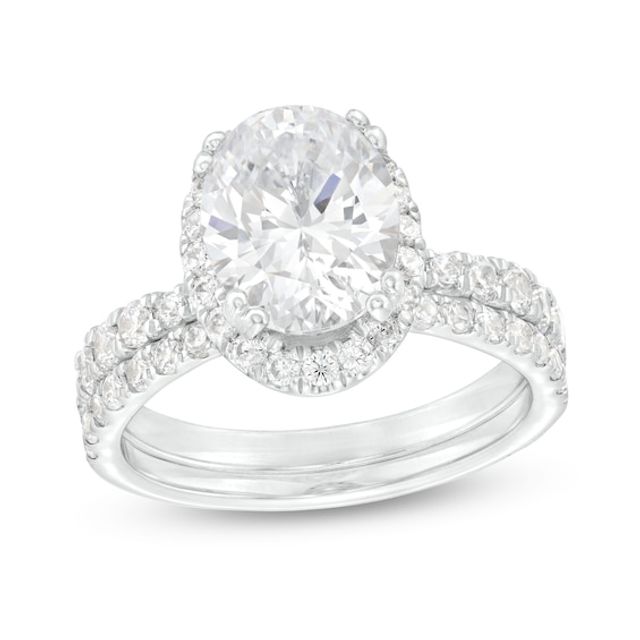 2-7/8 CT. T.w. Certified Oval Lab-Created Diamond Frame Bridal Set in 14K White Gold (I/Si2)
