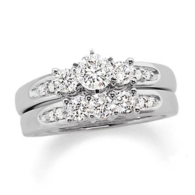 Previously Owned - 1-1/2 CT. T.w. Diamond Channel Three Stone Bridal Set in 14K White Gold