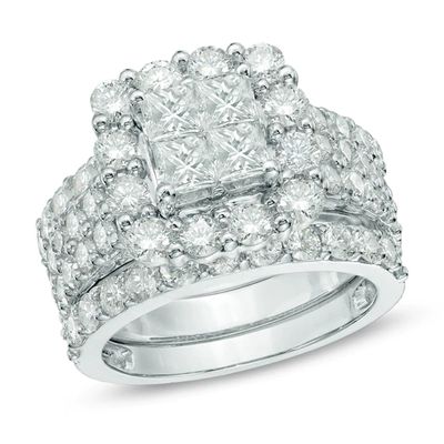 Previously Owned - 4 CT. T.w. Quad Princess-Cut Diamond Frame Bridal Set in 14K White Gold