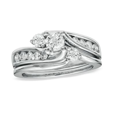 Previously Owned - 1 CT. T.w. Diamond Three Stone Swirl Bridal Set in 14K White Gold