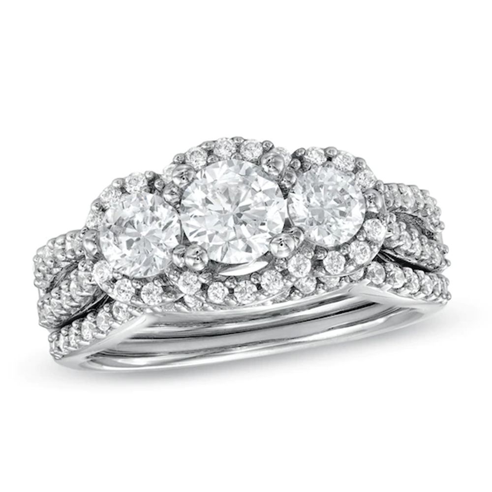 Previously Owned 1-1/2 CT. T.w. Diamond Three Stone Frame Soldered Bridal Set in 14K White Gold