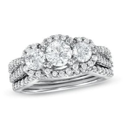 Previously Owned 1-1/2 CT. T.w. Diamond Three Stone Frame Soldered Bridal Set in 14K White Gold