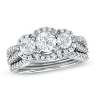 Previously Owned 1-1/2 CT. T.w. Diamond Three Stone Frame Soldered Bridal Set in 14K White Gold
