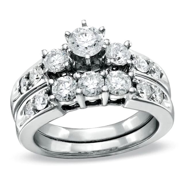 Previously Owned - 2 CT. T.w. Diamond Three Stone Bridal Set in 14K White Gold