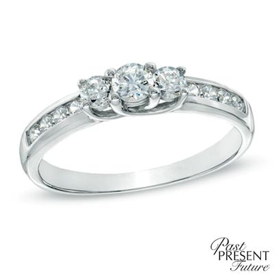 Previously Owned - 1/2 CT. T.w. Diamond Three Stone Engagement Ring in 10K White Gold