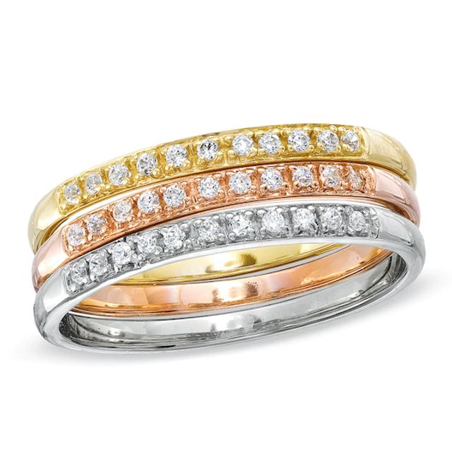 Previously Owned - 1/4 CT. T.w. Diamond Stacked Three Ring Set in 10K Tri-Tone Gold