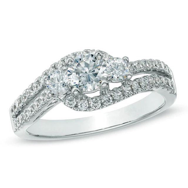 Previously Owned - 1 CT. T.w. Diamond Three Stone Swirl Ring in 14K White Gold (I/I1)