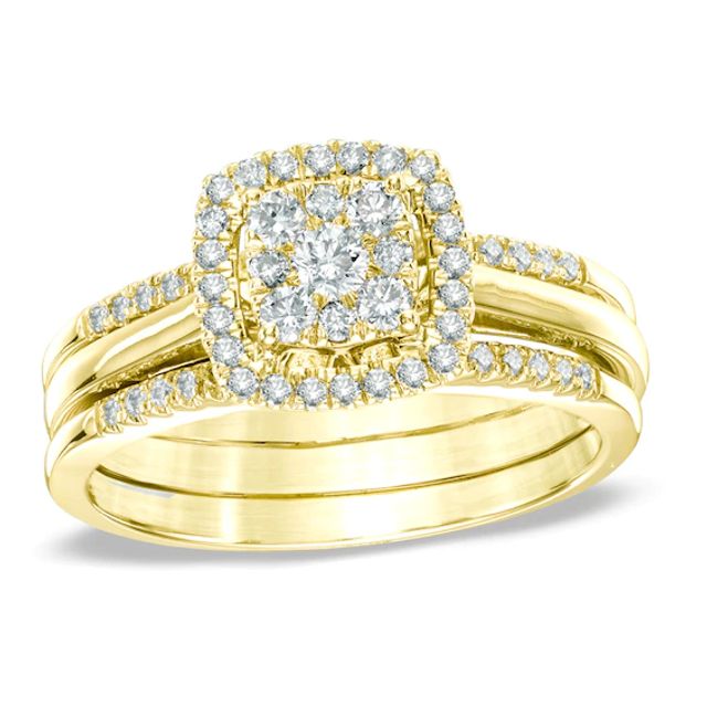 Previously Owned - 1/2 CT. T.w. Diamond Cluster Frame Three Piece Bridal Set in 10K Gold