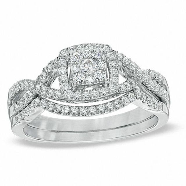 Previously Owned - 1/2 CT. T.w. Cushion-Shaped Multi-Diamond Twist Shank Bridal Set in 10K White Gold