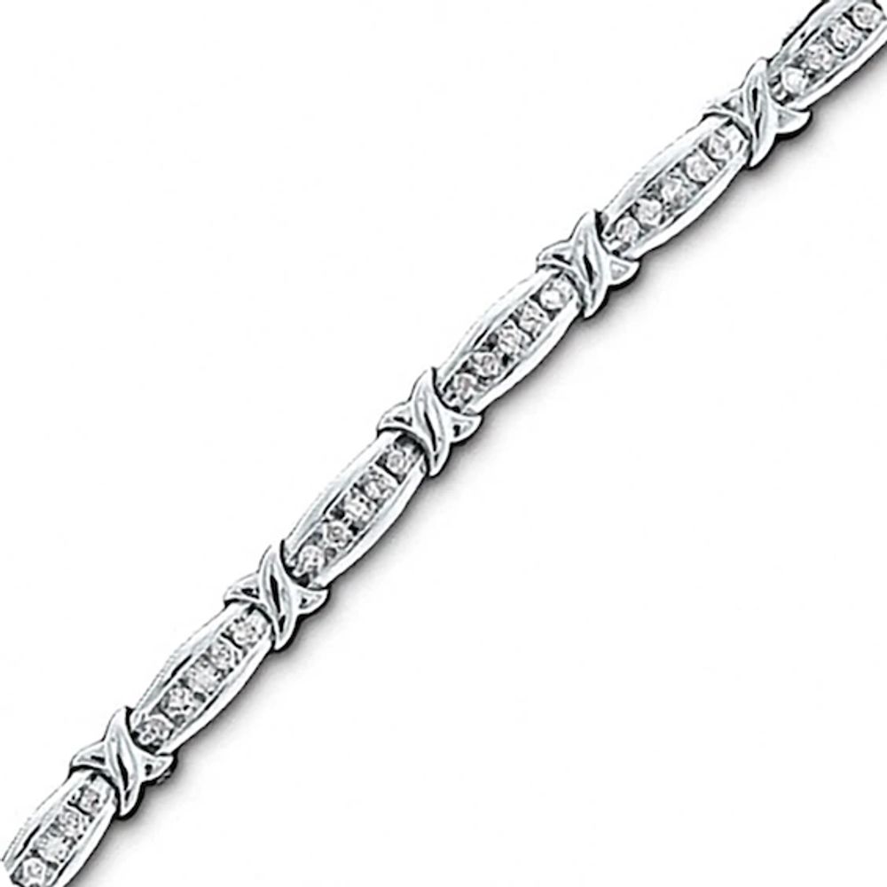 Previously Owned - 1 CT. T.w. Diamond Channel "X" Bracelet in 10K White Gold