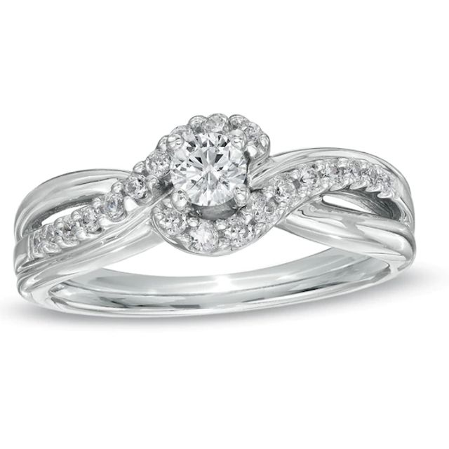 Previously Owned - 1/2 CT. T.w. Diamond Twist Engagement Ring in 14K White Gold