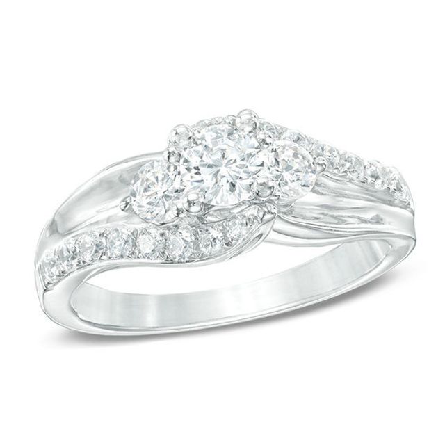 Previously Owned - 1 CT. T.w. Diamond Three Stone Swirl Engagement Ring in 14K White Gold