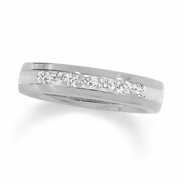 Previously Owned - 1/4 CT. T.w. Channel Set Diamond Wedding Band in 14K White Gold