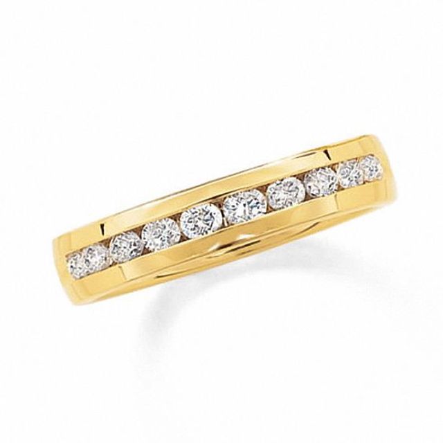 Previously Owned - Men's 1/2 CT. T.w. Diamond Channel Band in 14K Gold