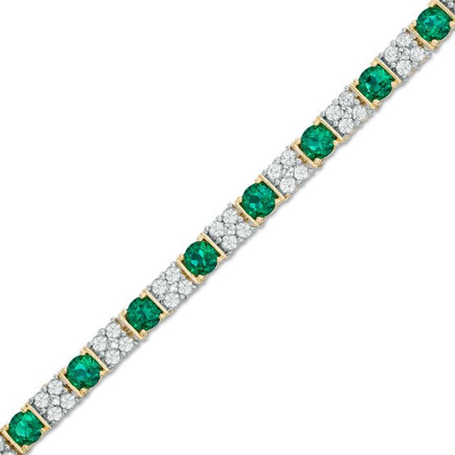 Previously Owned - Baguette Lab-Created Emerald and White Sapphire Bracelet in Sterling Silver with 14K Gold Plate - 7.25"