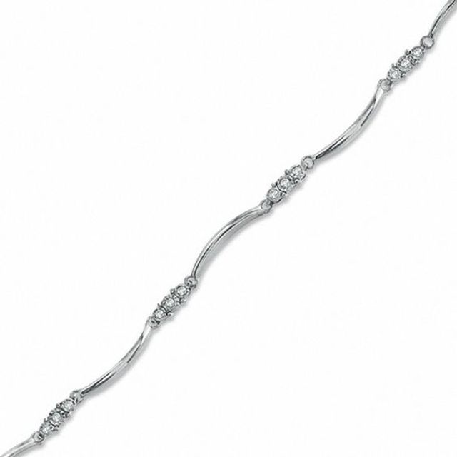 Previously Owned - 1/7 CT. T.w. Diamond Three Stone Station Bracelet in 10K White Gold