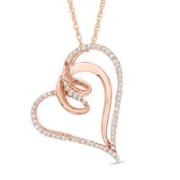 Previously Owned - 1/6 CT. T.w. Diamond Looping Tilted Heart Pendant in 10K Rose Gold