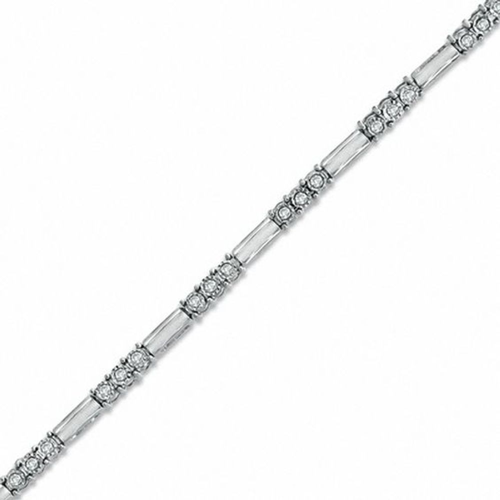 Previously Owned - 1/4 CT. T.w. Diamond Three Stone Line Bracelet in 10K White Gold