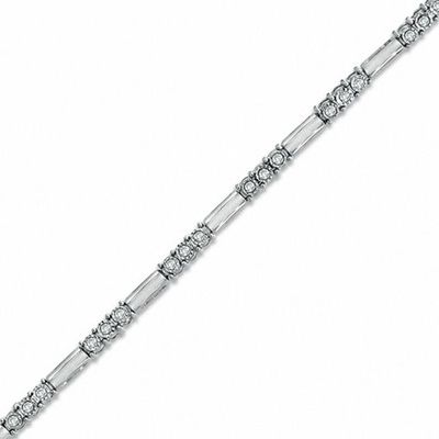 Previously Owned - 1/4 CT. T.w. Diamond Three Stone Line Bracelet in 10K White Gold
