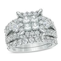 Previously Owned 4 CT. T.w. Quad Princess-Cut Diamond Frame Soldered Bridal Set in 14K White Gold