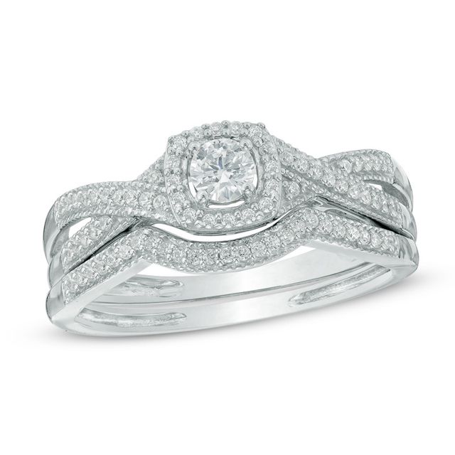 Previously Owned - 1/3 CT. T.w. Diamond Cushion Frame Twisted Shank Bridal Set in 10K White Gold