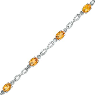 Previously Owned - Oval Madeira Citrine Infinity Link Bracelet in Sterling Silver - 7.25"