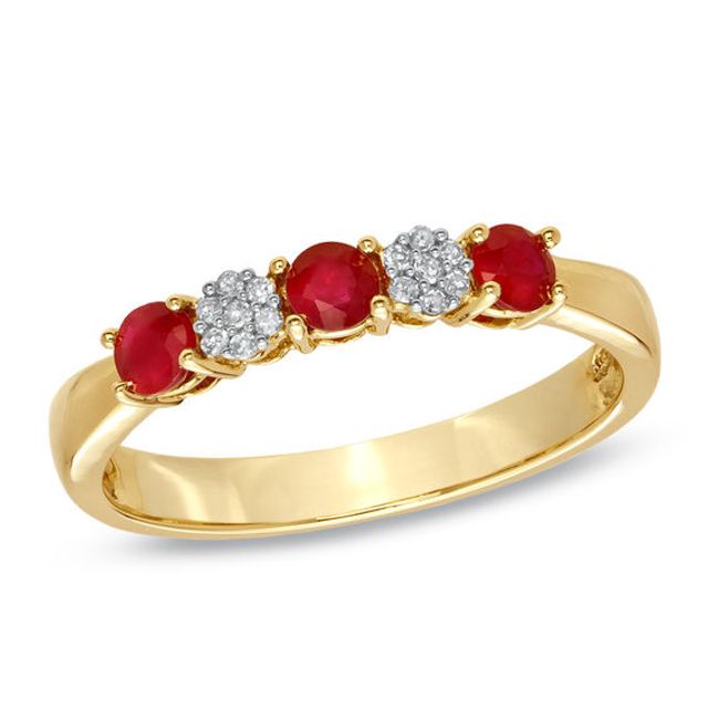 Previously Owned - Ruby and 1/20 CT. T.w. Diamond Three Stone Band in 10K Gold