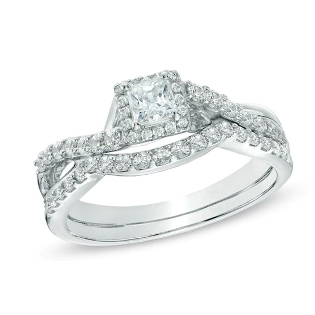 Previously Owned - 3/4 CT. T.w. Princess-Cut Diamond Frame Twist Shank Bridal Set in 10K White Gold