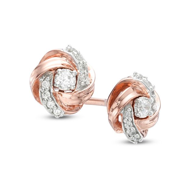 Previously Owned - 1/8 CT. T.w. Diamond Love Knot Stud Earrings in 10K Rose Gold