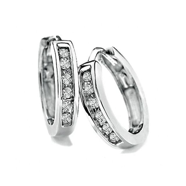 Previously Owned - 1/4 CT. T.w. Diamond Huggie Hoop Earrings in 10K White Gold