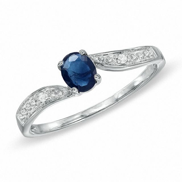 Previously Owned - Oval Blue Sapphire and Diamond Accent Engagement Ring in 10K White Gold