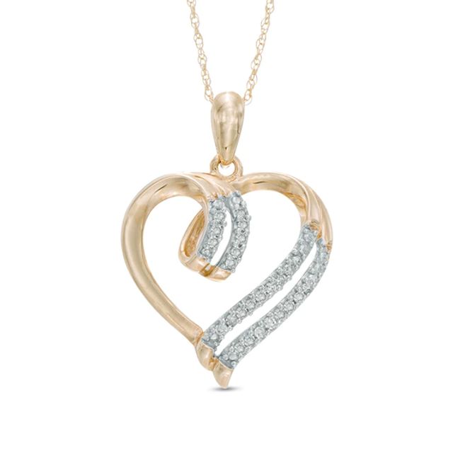Previously Owned - 1/10 CT. T.w. Diamond Double Row Heart Pendant in 10K Gold
