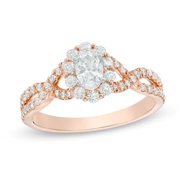 Previously Owned - Love's Destiny by Zales 7/8 CT. T.w. Oval Diamond Frame Twist Engagement Ring in 14K Rose Gold