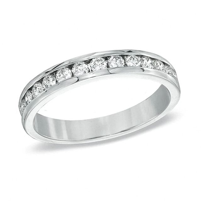 Previously Owned - 1/2 CT. T.w. Diamond Anniversary Band in 18K White Gold (F/I1)