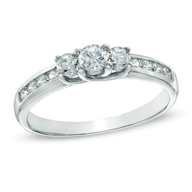 Previously Owned - 1/2 CT. T.w. Diamond Three Stone Engagement Ring in 10K White Gold