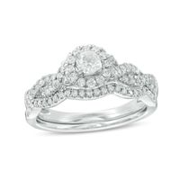 Previously Owned - 1/2 CT. T.w. Diamond Frame Twist Bridal Set in 10K White Gold