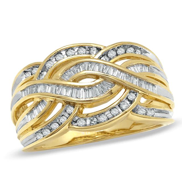 Previously Owned - 3/8 CT. T.w. Baguette and Round Diamond Twist Band in 10K Gold