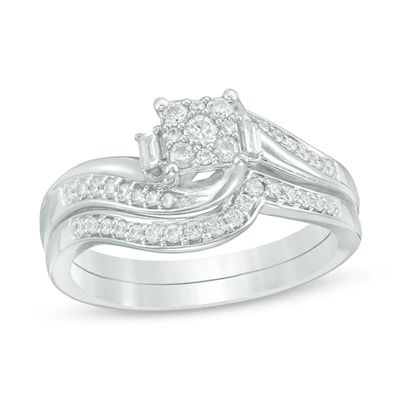 Previously Owned - 1/3 CT. T.w. Composite Diamond Bypass Swirl Bridal Set in 10K White Gold