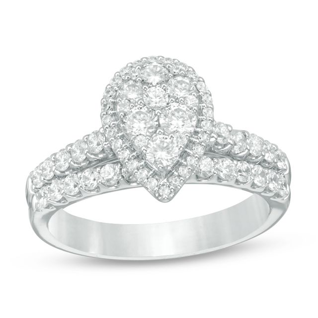 Previously Owned - 1 CT. T.w. Pear-Shaped Multi-Diamond Frame Bridal Set in 14K White Gold