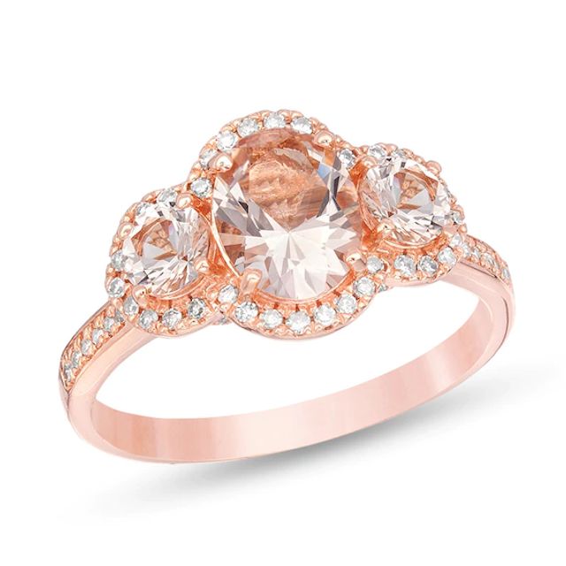 Previously Owned - Oval Morganite and 1/5 CT. T.w. Diamond Frame Three Stone Engagement Ring in 14K Rose Gold