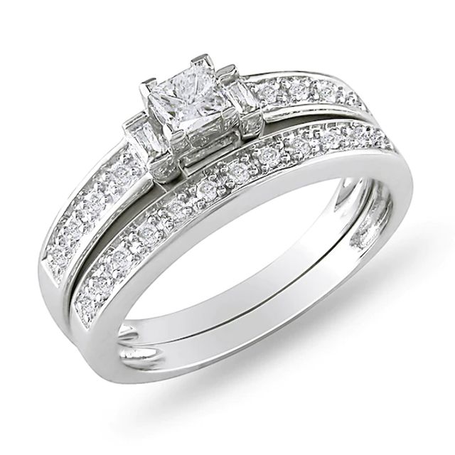 Previously Owned - 1/3 CT. T.w. Princess-Cut and Baguette Diamond Three Stone Bridal Set in Sterling Silver