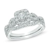 Previously Owned - 1 CT. T.w. Princess-Cut Diamond Frame Twist Bridal Set in 14K White Gold