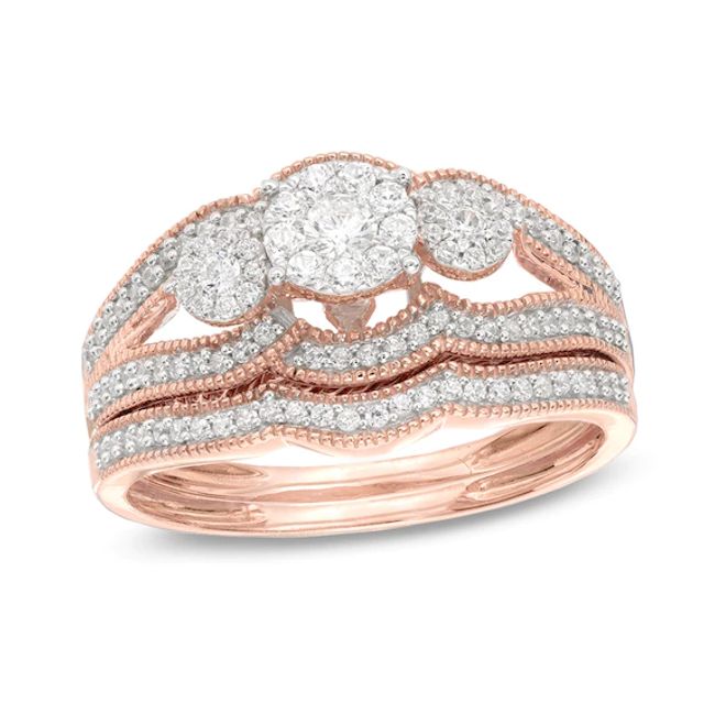 Previously Owned - 1/2 CT. T.w. Composite Diamond Three Stone Vintage-Style Bridal Set in 10K Rose Gold