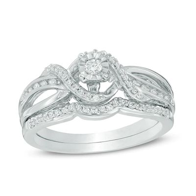 Previously Owned - 1/4 CT. T.w. Diamond Twist Crossover Bridal Set in Sterling Silver