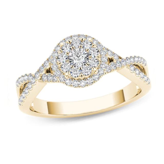 Previously Owned - 1/2 CT. T.w. Diamond Frame Twist Shank Engagement Ring in 14K Gold