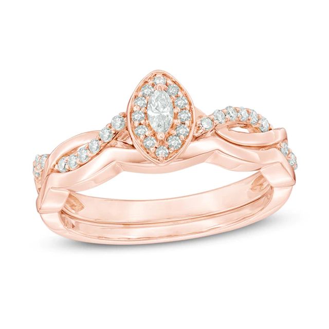 Previously Owned - 1/4 CT. T.w. Marquise Diamond Frame Twist Bridal Set in 10K Rose Gold