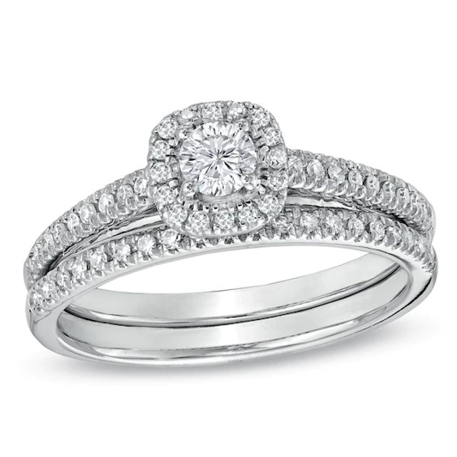 Previously Owned - 1/2 CT. T.w. Diamond Frame Bridal Set in 14K White Gold