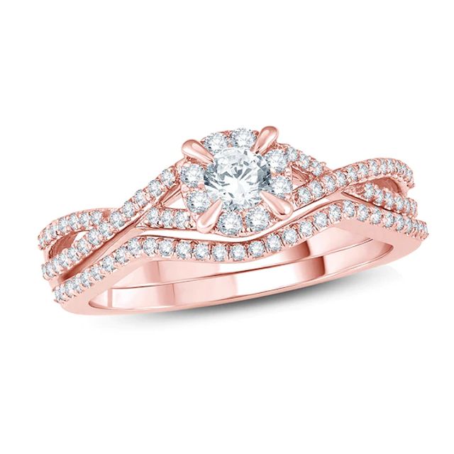 Previously Owned 1/2 CT. T.w. Diamond Frame Twist Soldered Bridal Set in 14K Rose Gold