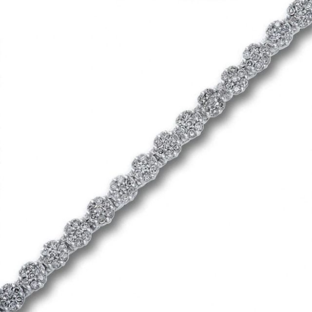 Previously Owned - 1 CT. T.w. Diamond Flower Tennis Bracelet in 10K White Gold